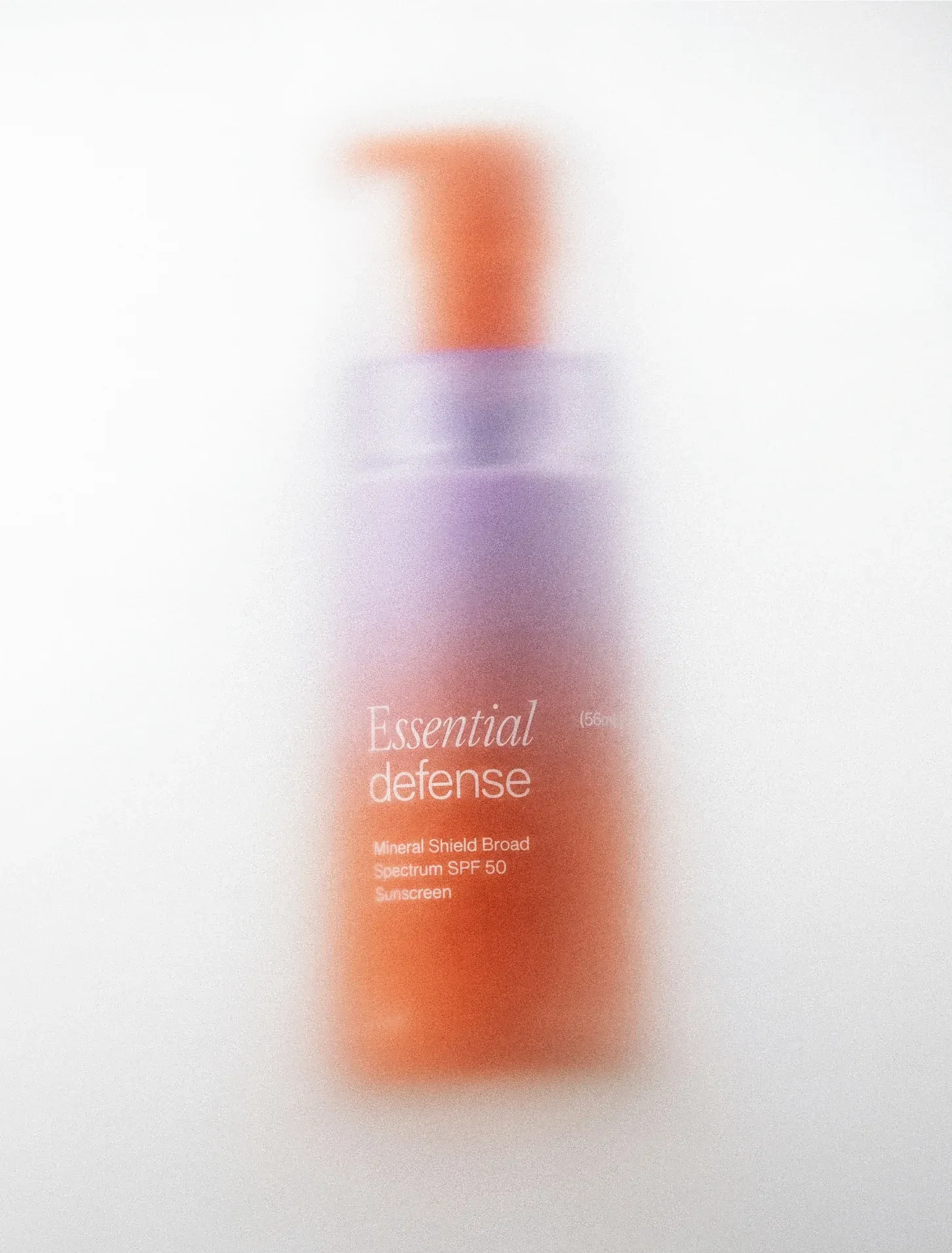 Blurred Winona Essential Defense bottle.