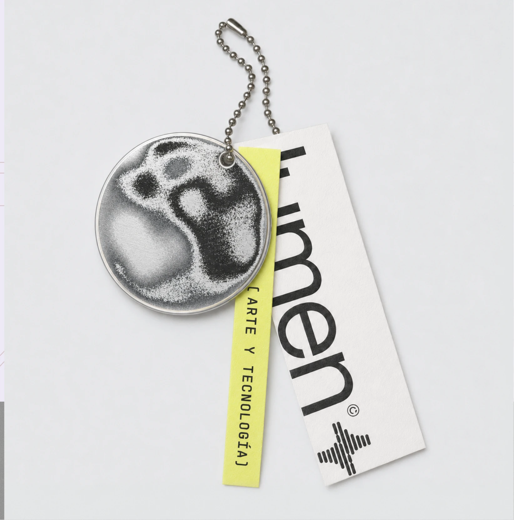 Lumen keychain and printed tag.