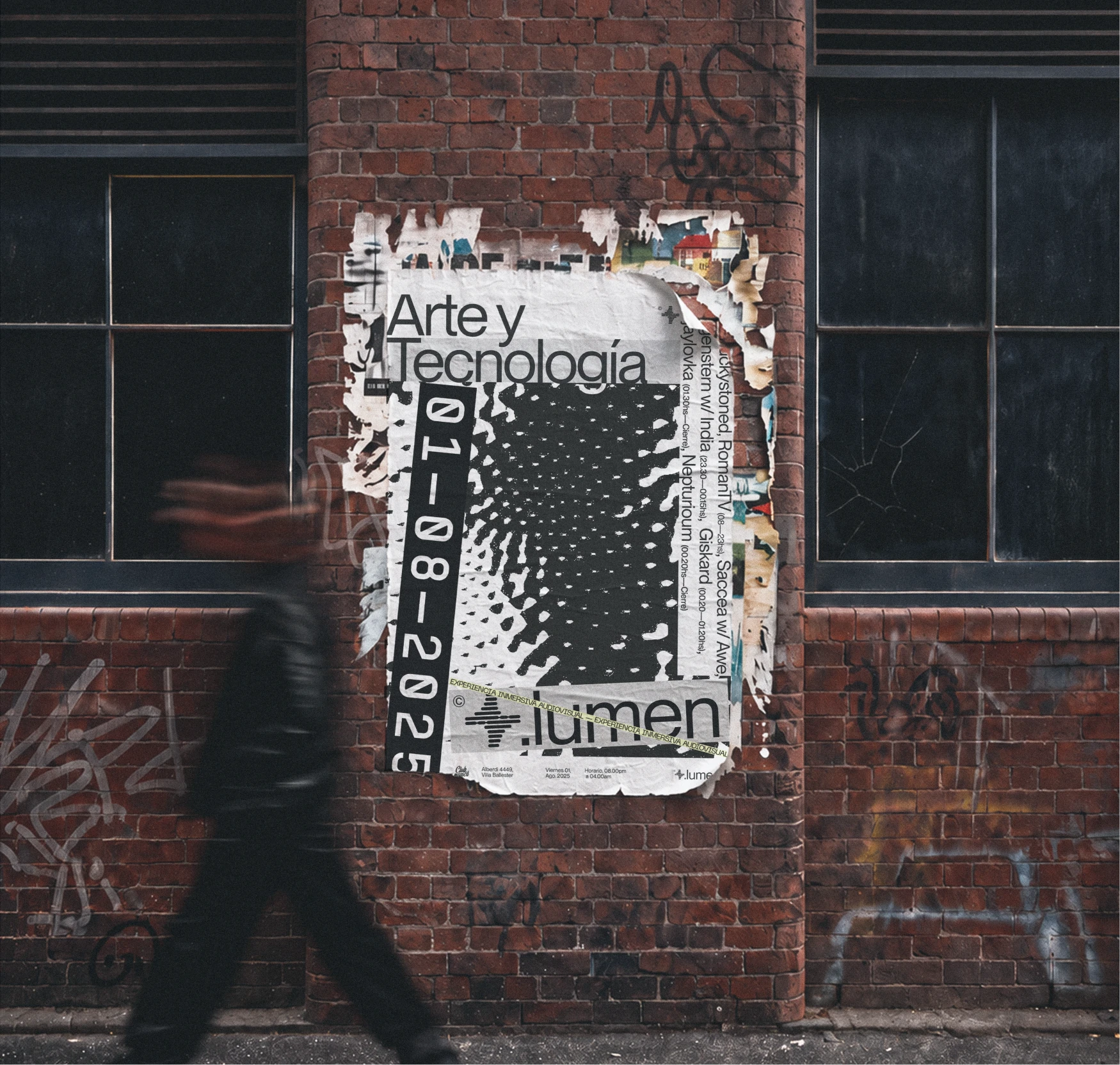 Lumen event poster installed on a brick wall.